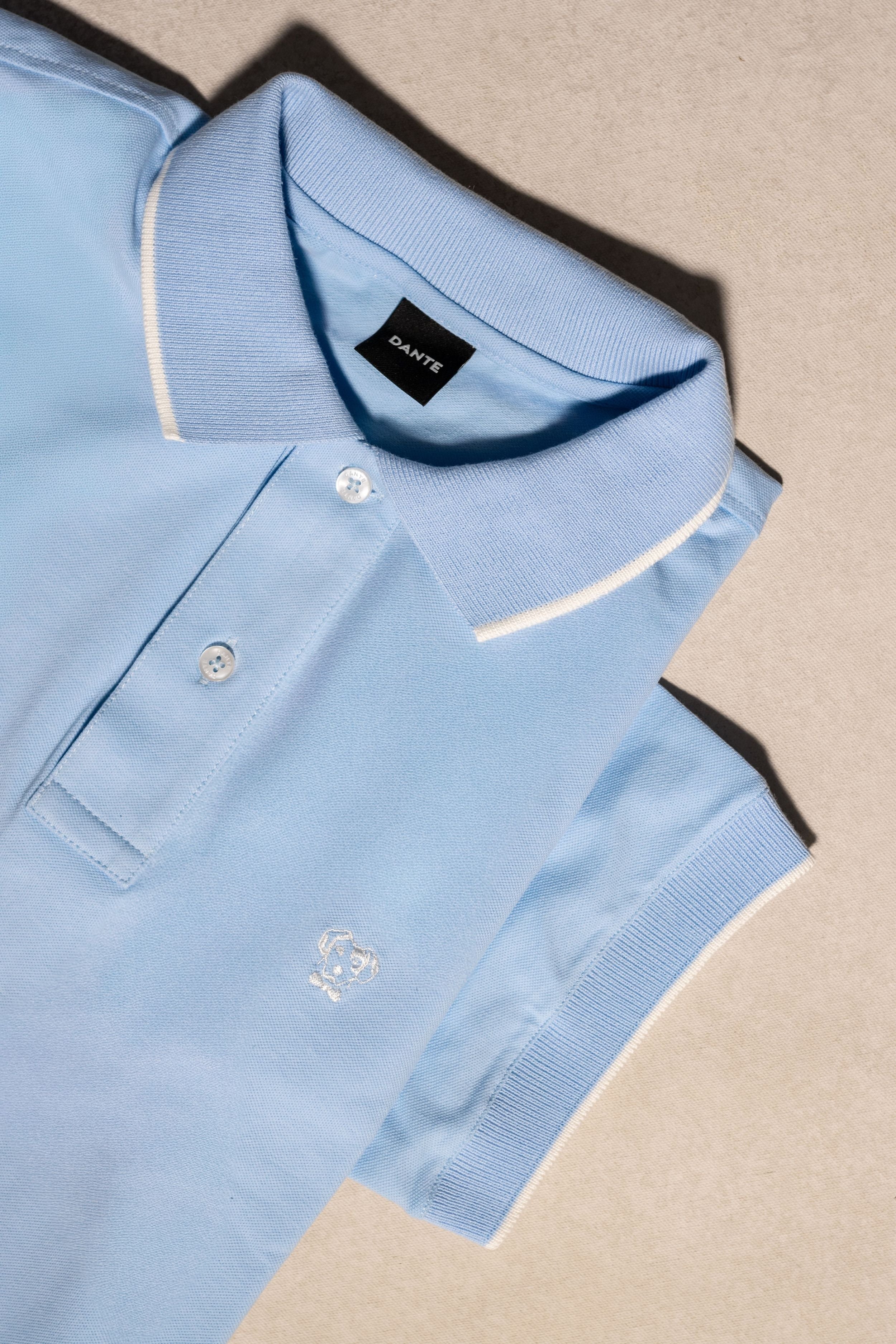 Polo Antimanchas Baby Blue Detalles Blancos